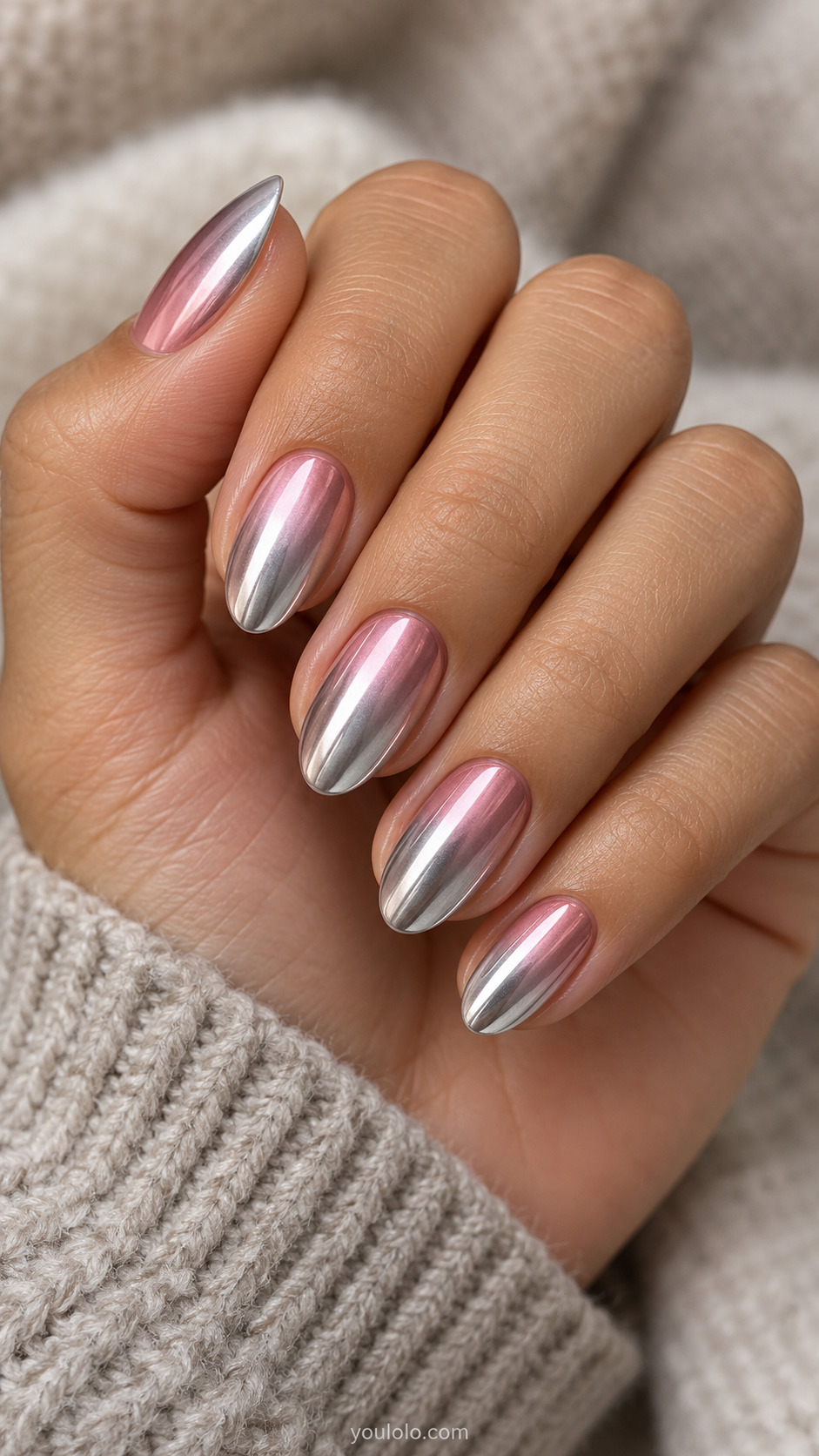Pink-to-Silver Chrome Ombre on a naturally gathered feminine hand showing the nail finish